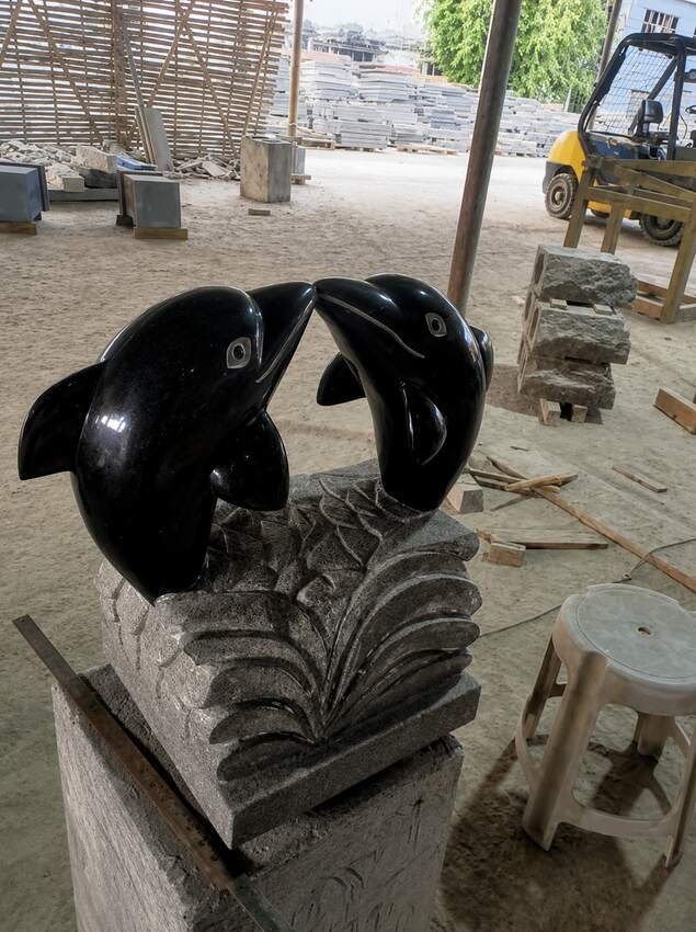 Dual Dolphin Granite Monument